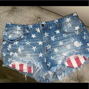 High-rise star print jean shorts